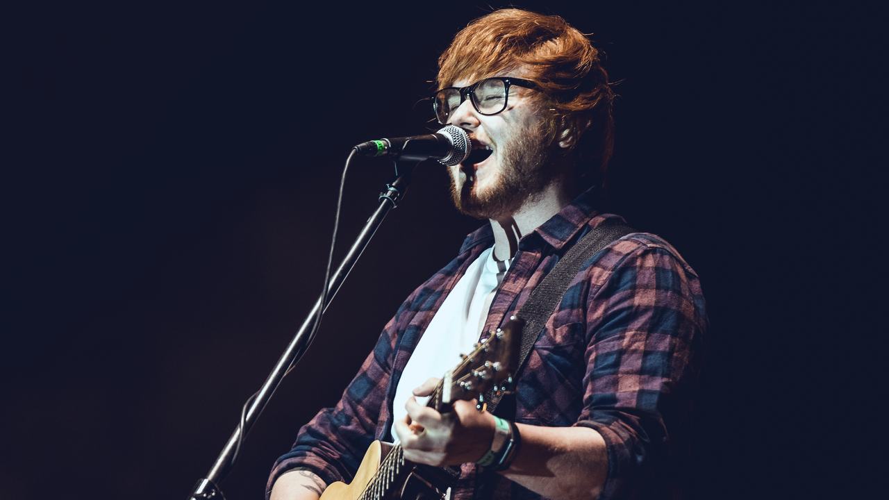 Thinking Out Loud's Ed Sheeran tribute singing with guitar on stage